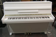Urk and sons small white satin piano
