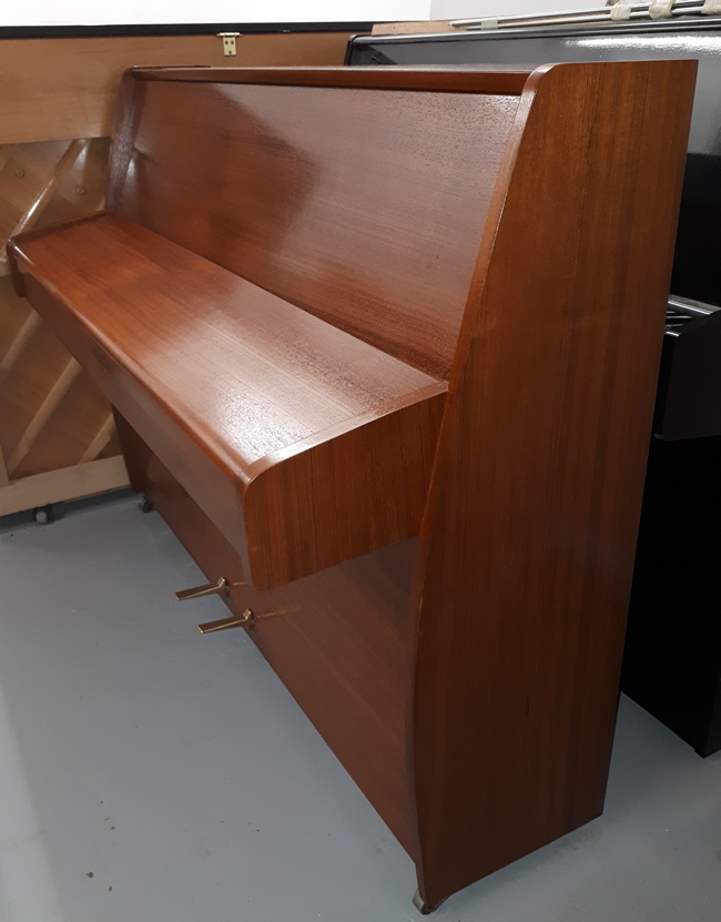 Zender Teak satin upright piano sideview.